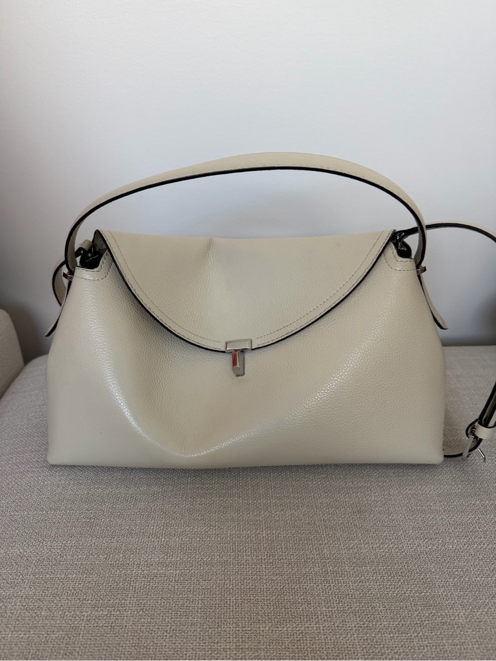 Toteme T-lock  bag price is firm.